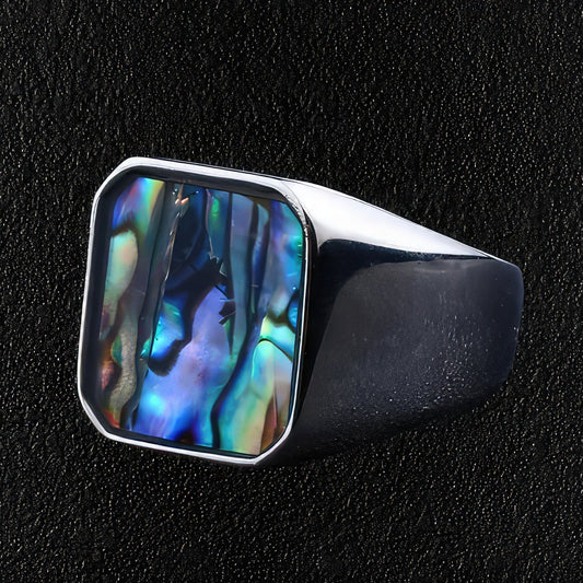 Men's Stainless steel signet ring with abalone shell insert.