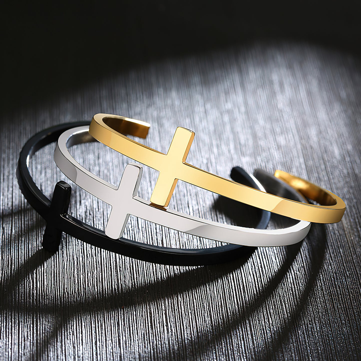 Zuringa minimalist style cross bangle. 